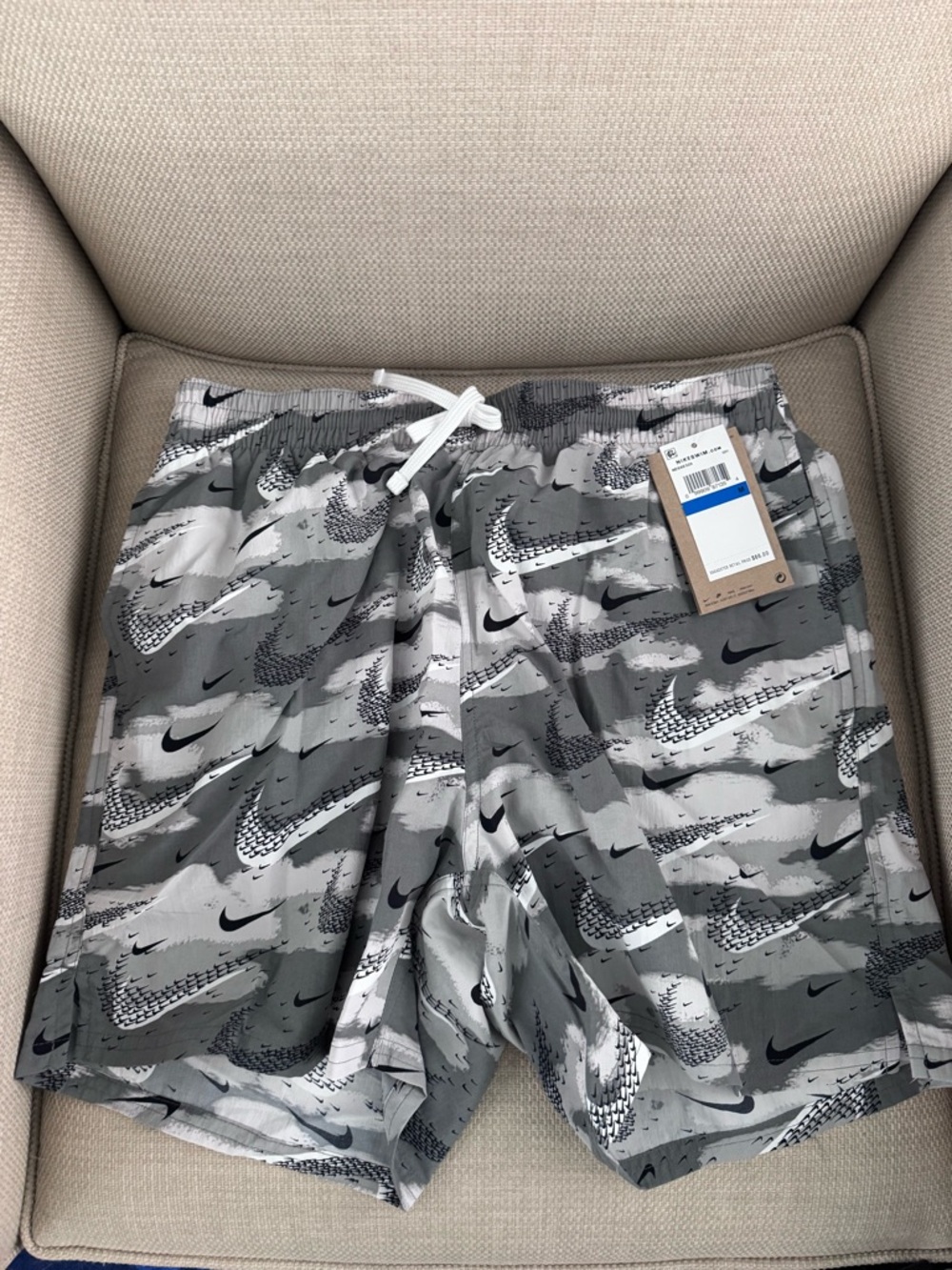 Nike Men’s Gray Camo Swim Shorts with Swoosh Print, size Medium
